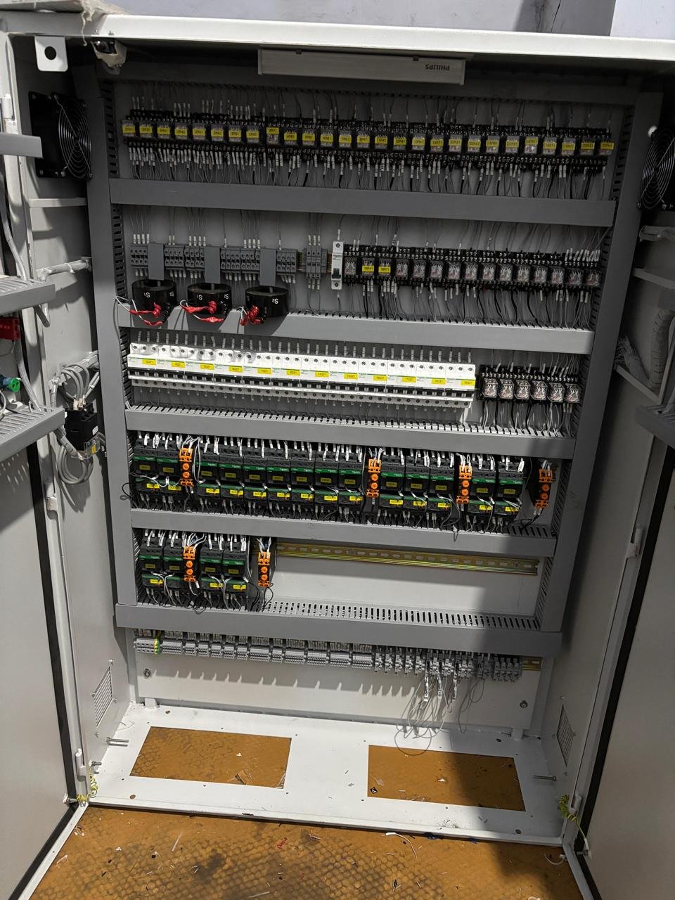 Completed electrical enclosure with organized terminal layout